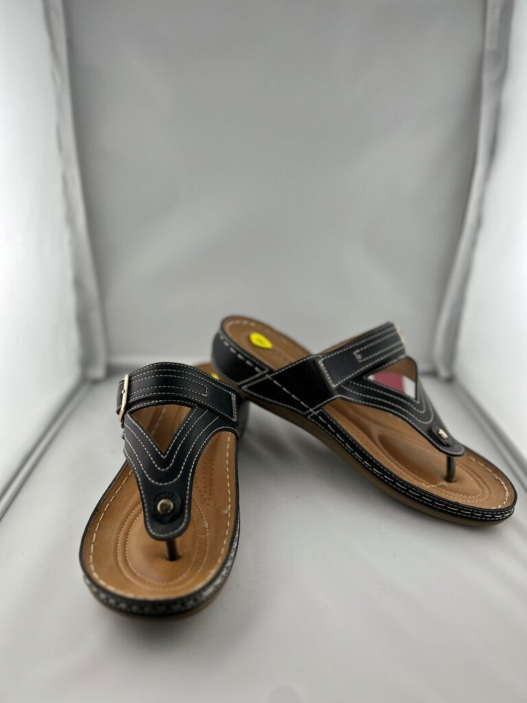 Flex step black and tan slip on thong sandals with silver buckles